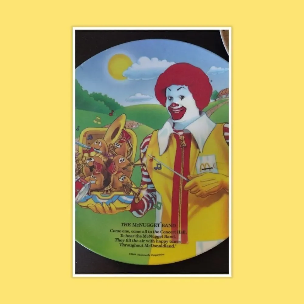 1989 (2) MCDONALD'S ADVERTISING THE MCNUGGET BAND PLASTIC PLATE